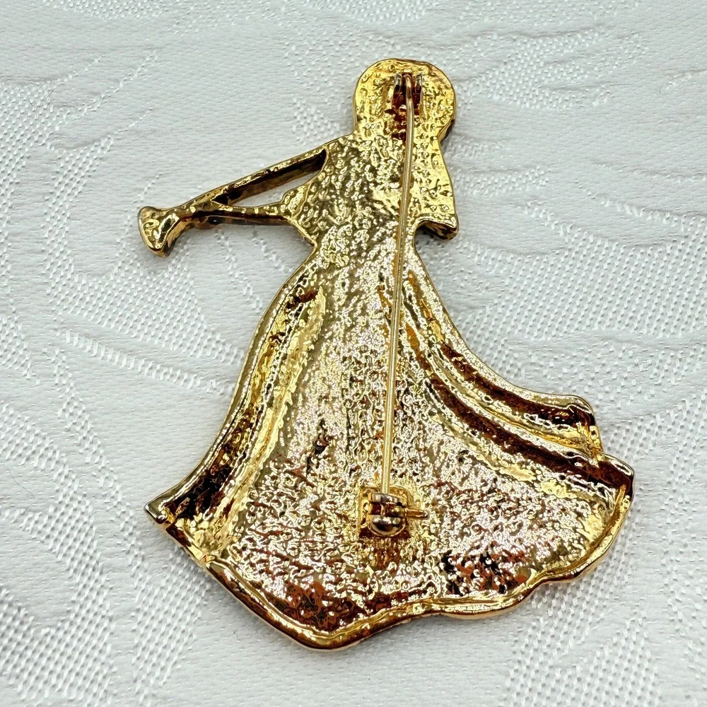 Vintage Gold Tone Girl Playing Alphorn Instrument Brooch w/ AB Rhinestones